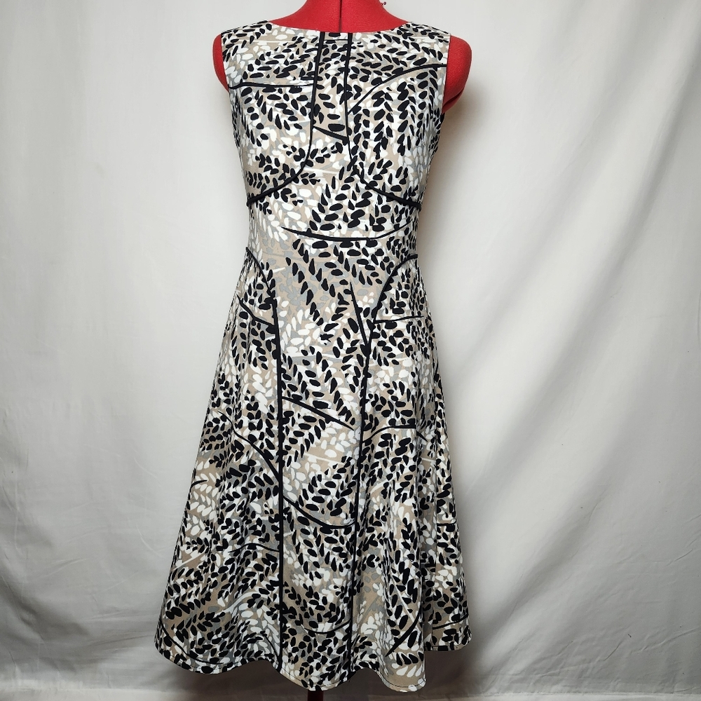 Elegant London Times Black, Tan, and Cream Leaf Patterned Sleeveless Dress
